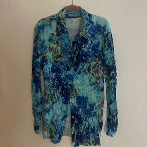 Blouse long sleeve multi color blues greens browns . Pleated bottom and sleeves